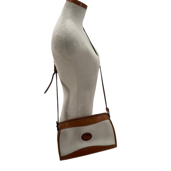 Dooney & Bourke Handbags - Vintage Dooney and Bourke white and brown leather crossbody bag